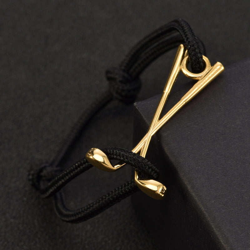 Laden Sie das Bild in den Galerie-Viewer, Golf Armband Edelstahl-goldfarben - schwarz